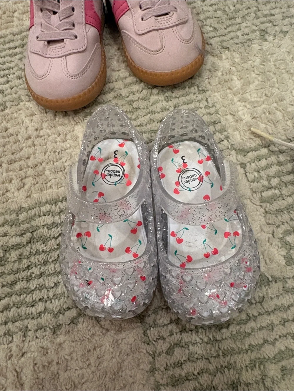 Nike Kids White Sneakers with Pink Swoosh and Accents